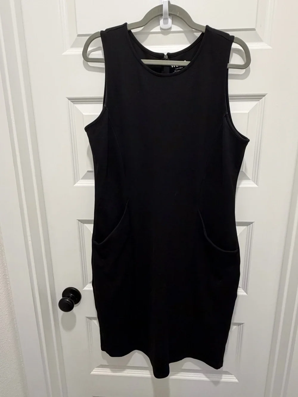 Classic wardrobe staple: Women's Black Sleeveless Sheath Dress - Picture 2 of 5